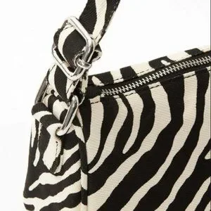 Brandy melville zebra purse hotsell